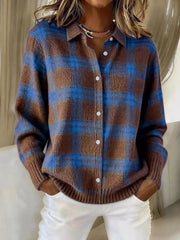 On-model front view of a brown and blue plaid button-down knit cardigan with long sleeves