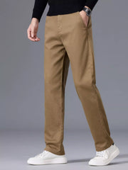 Men's khaki slim-fit pants made from cotton with pockets.