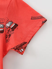 Close-up detail of the short sleeve and fire truck print on red children's T-shirt