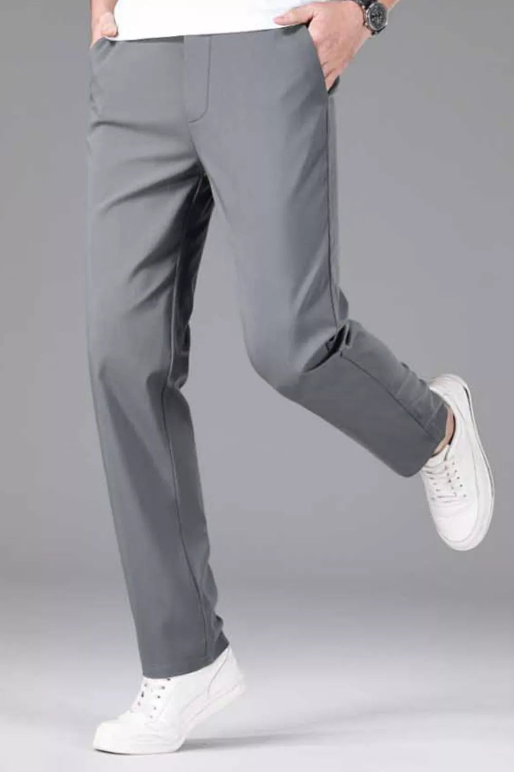 Men's gray straight-leg casual pants with stretch fabric and a drawstring waist.
