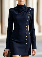 Model outdoors wearing navy mock neck mini dress with long sleeves and gold decorative buttons