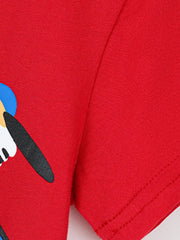 Close-up of red children's t-shirt sleeve hem stitching and plain red fabric