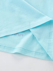 Close-up of the mint blue hem stitching detail on a children's short sleeve T-shirt