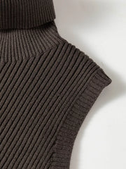 Close up of coffee brown ribbed shoulder and armhole on sweater vest