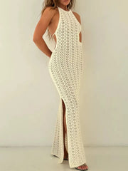 Three quarter view of beige crochet halter neck bodycon knit cover up dress with slit