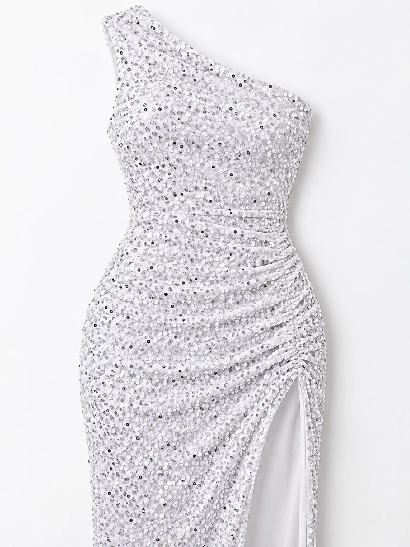 White sequin one shoulder evening dress close view showing the ruched waist and sequin texture
