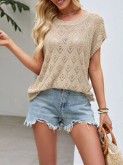 On-model front view of khaki openwork short sleeve knit top with heart shaped perforations outdoors
