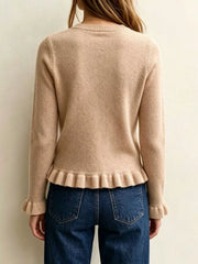 Back view on-model of khaki crew neck sweater with ruffled hem and cuffs