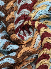 Close view of khaki striped crochet knit fabric texture of midi dress