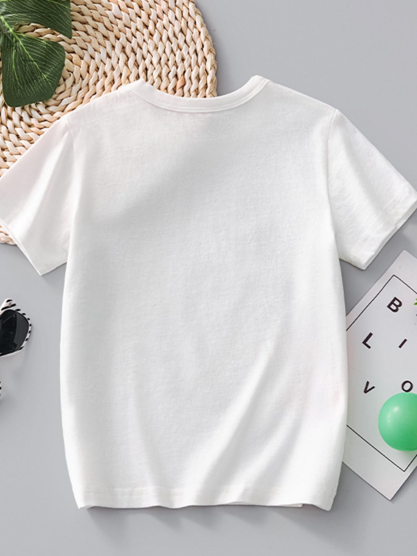 Plain back view of the white children's crew neck short sleeve t-shirt