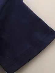Close-up of the black short sleeve hem with neat double stitching