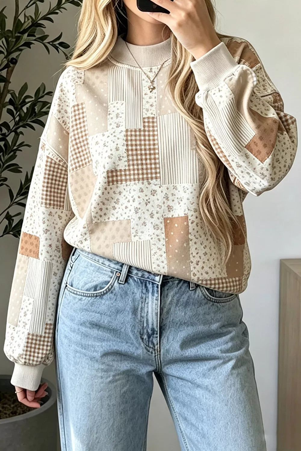 Tan vintage patchwork dropped shoulder sweatshirt with floral, gingham and striped panels, front view