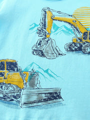 Close view of the yellow excavator and bulldozer print with mountain details on pastel blue fabric