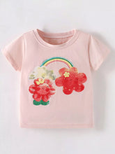 Front view of blush pink children's short sleeve tee with smiling red flowers and rainbow print