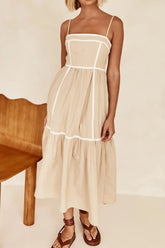 Women's tan midi cami dress with a square neckline and contrast trim.