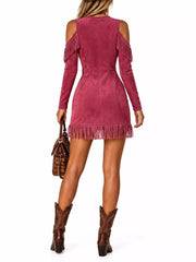 Back view of hot pink fringed cold shoulder mini dress with long sleeves