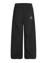 Men's casual pants with a wide leg silhouette.