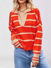 Close-up on-model front view of orange red striped sweater with beige Johnny collar