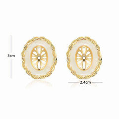Pendientes ovalados con decoración tribal en oro de 14 quilates