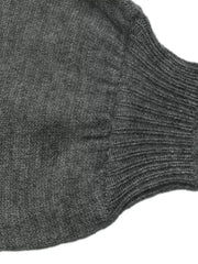 Close up of dark grey sweater ribbed off shoulder neckline and knit texture