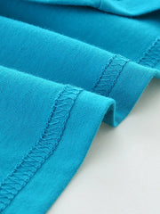 Close-up of the sky blue hem stitching detail on a children's round neck T-shirt