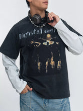 Men's vintage-washed graphic T-shirt featuring a round neckline.