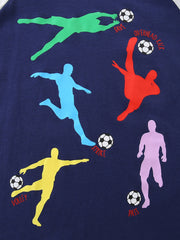 Close-up of the colorful soccer player silhouettes and soccer balls on dark navy fabric
