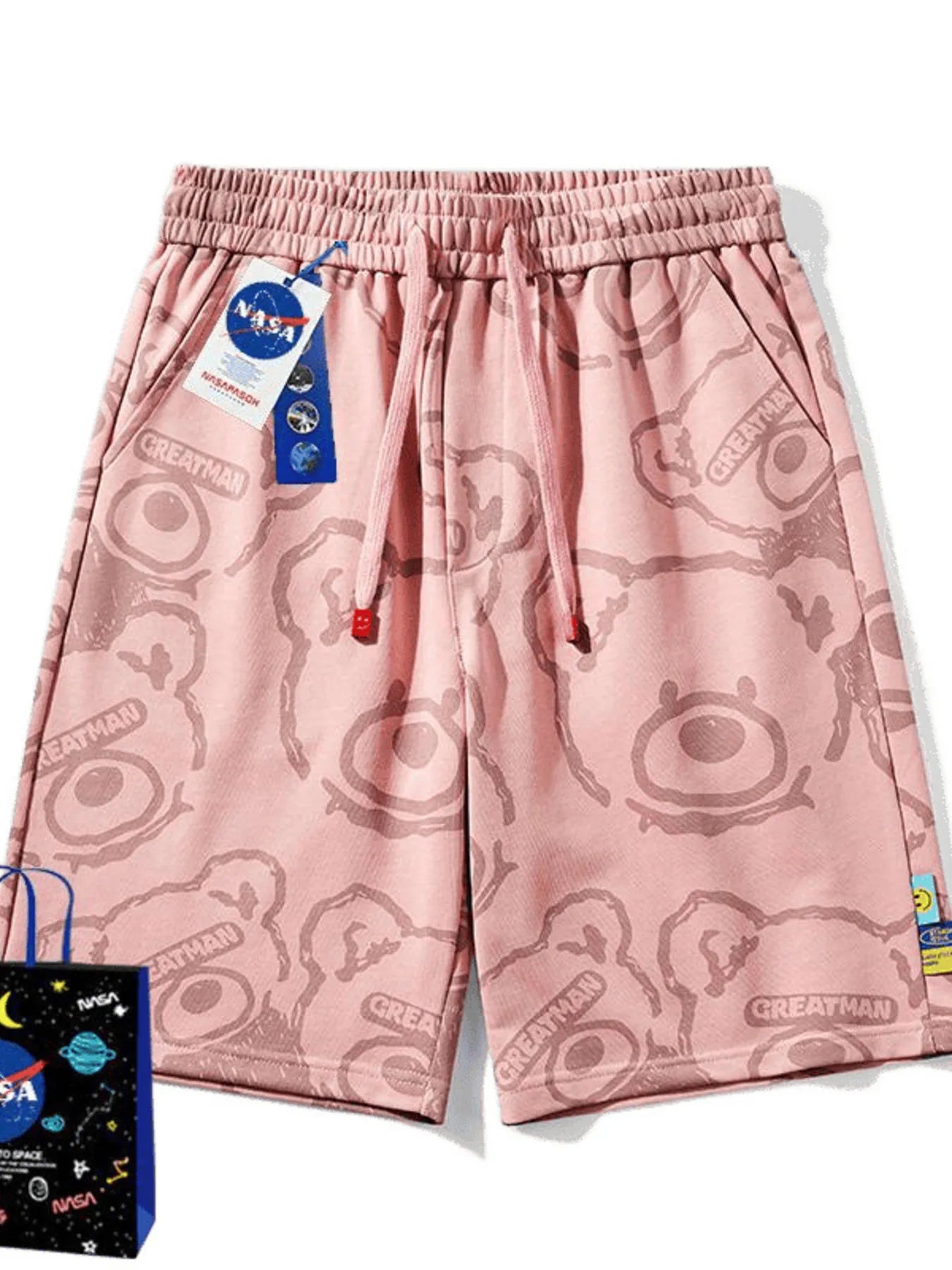 Men's pink bear-print shorts with a drawstring waist and pockets.