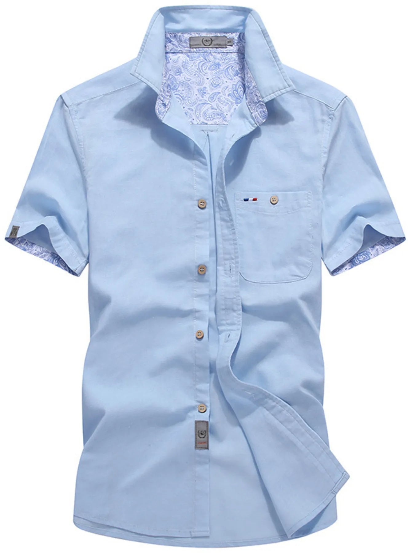 Men's short-sleeve button-up shirt with pocket detailing in a cotton-spandex blend.