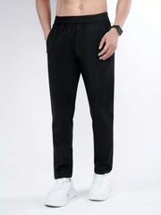 Men's black slim-fit pants with a drawstring waist and pockets.