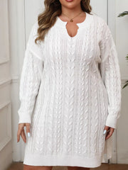 Front view of white cable knit sweater dress with long sleeves and notched neckline