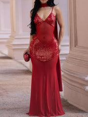 Red sequin V neck maxi dress with sheer mesh bodice, front view outdoors