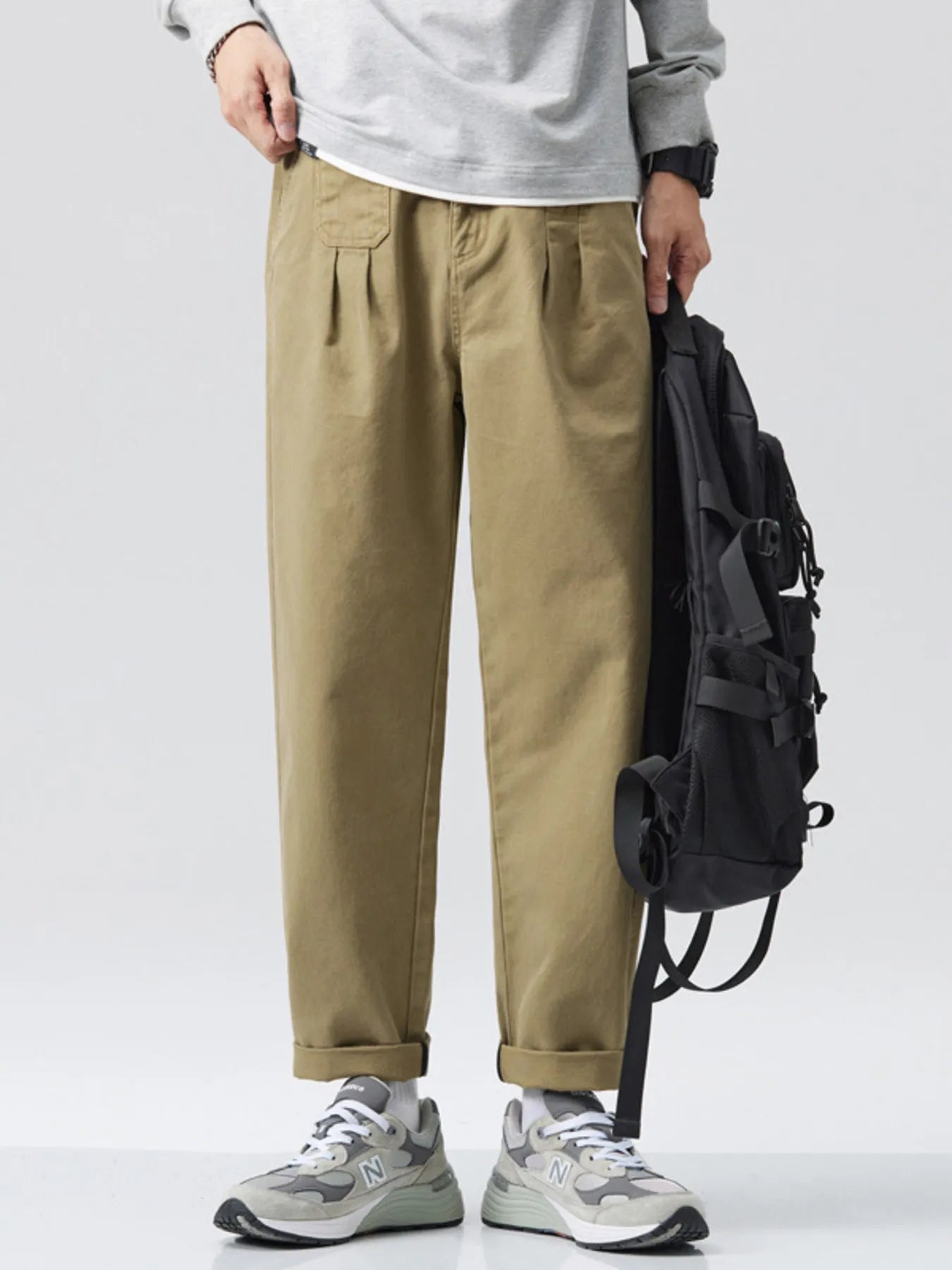Men's loose fit pants with a drawstring waist.