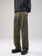 Men's wide leg pants with a drawstring waist and pockets.