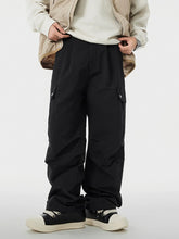Men's black cargo pants with wide legs and pockets.