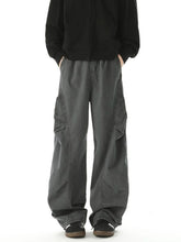 Men's loose fit cargo pants with pockets.