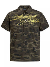 Men's camouflage short-sleeve polo made from a cotton-spandex blend.