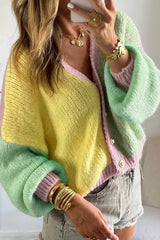 Front angle view of the patchwork cardigan with drop shoulders and mint sleeves