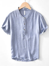Men's short-sleeve blouse featuring button detailing and a plus-size range.