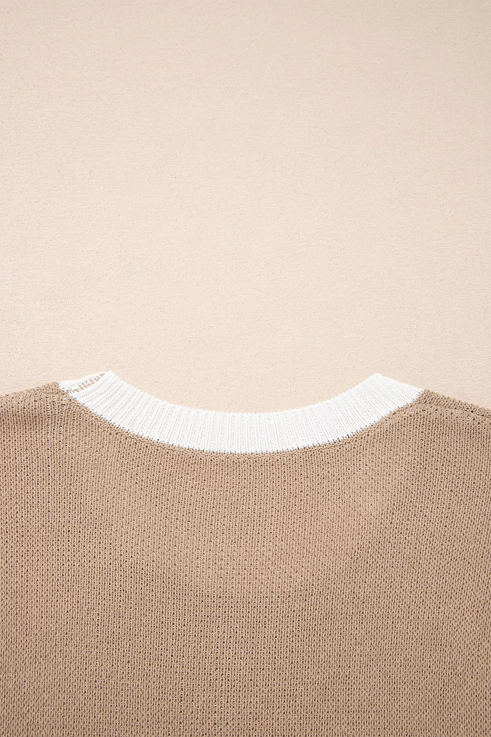 Close-up of the mocha sweater back neckline with white ribbed trim