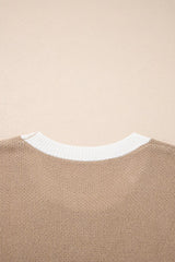 Close-up of the mocha sweater back neckline with white ribbed trim