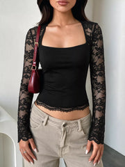 Black square-neck top with sheer floral lace long sleeves and a scalloped lace-trimmed hem.
