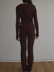 Back view of brown hooded cardigan and matching ribbed knit pants full length