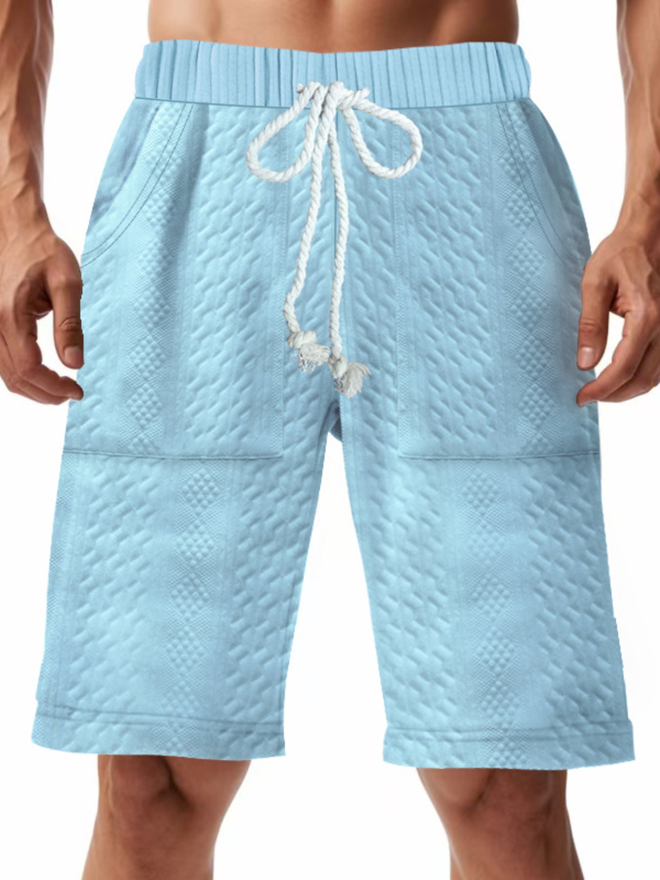 Men's light blue textured shorts with a drawstring waist and pockets.