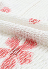 Top de punto con capucha y flores con cordón