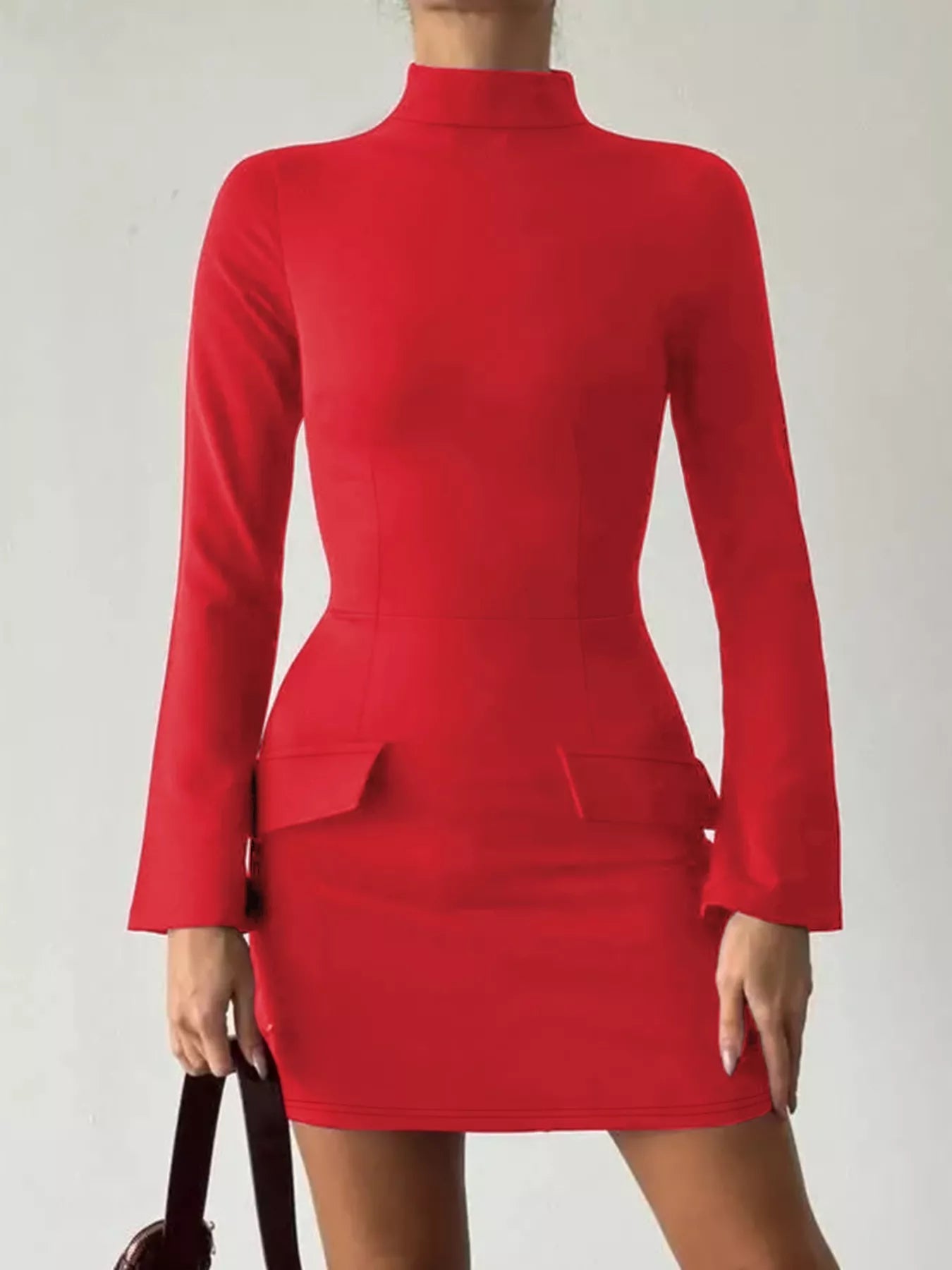 Deep red mock neck long sleeve bodycon dress worn on model, front view with flared cuffs