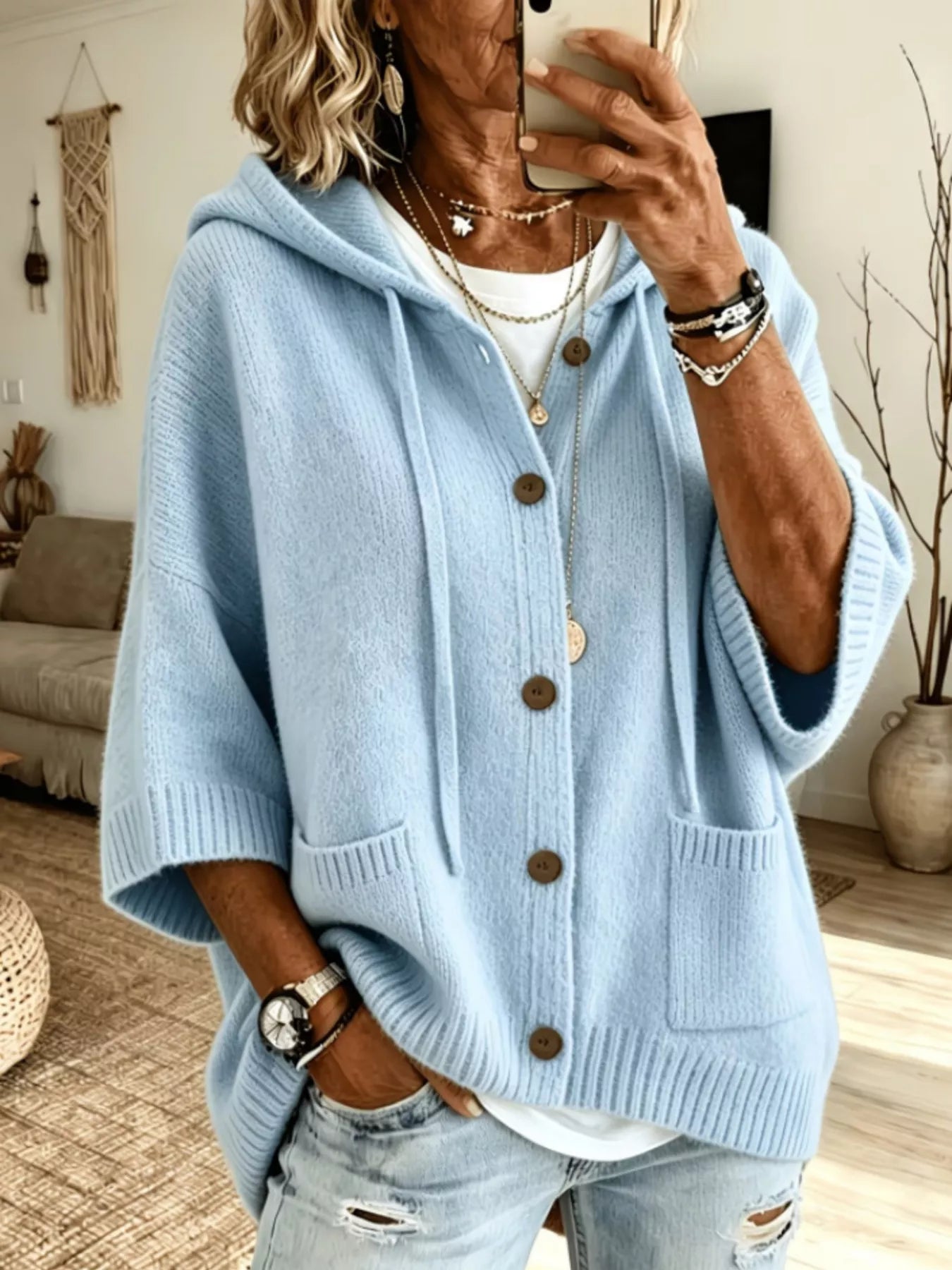Sky Blue hooded knit cardigan with brown buttons and patch pockets shown from the front on model