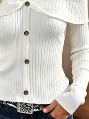 Close up of white cold shoulder ribbed knit top bodice showing ribbing and front buttons