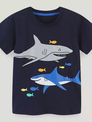 Front view of the black children's short sleeve t-shirt with gray and blue shark prints and small colorful fish