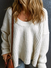 Front view of white slouchy chunky ribbed knit sweater with wide round neckline and long sleeves.